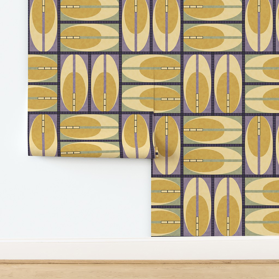 The artwork features a repeating geometric pattern of symmetrical shapes resembling elongated, curved diamonds or petals in various shades of blue and green. Each shape is split vertically with one half filled with a light blue and the other half filled with green or darker blue. The background is a light, almost pastel blue, which provides a soft yet vibrant backdrop. One of the blue shapes near the upper left contains a white starburst element, adding a focal point of brightness to the composition. The overall design conveys a modern, mid-century aesthetic with clean lines and harmonious color contrasts.